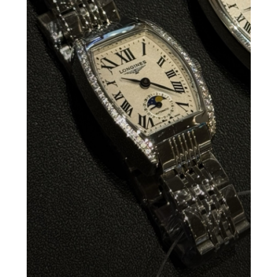 The Longines Heritage Collection L2.155.4.71.5 features a classic tonneau-shaped stainless steel case.